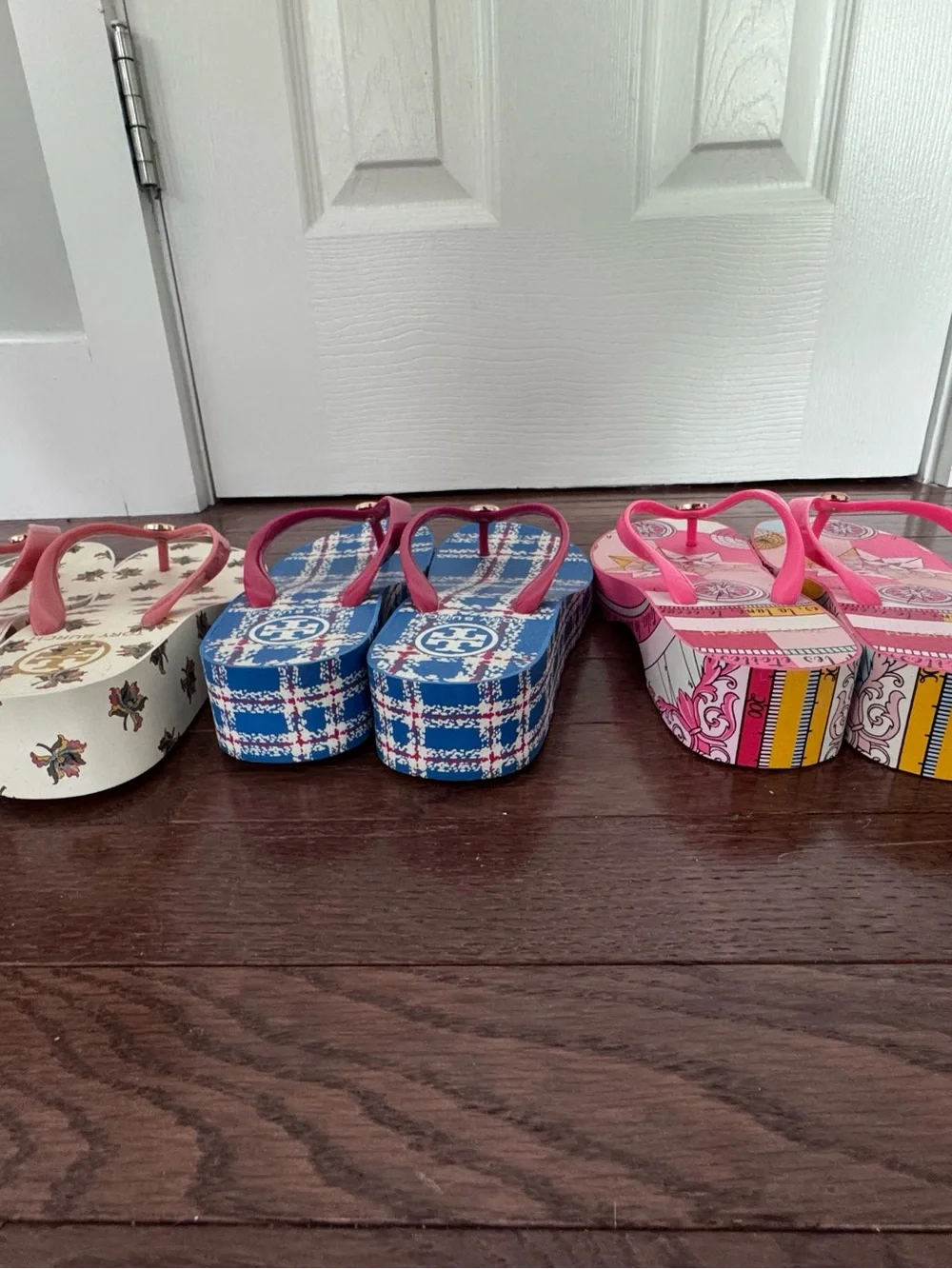 Tory Burch wedge flip flops.